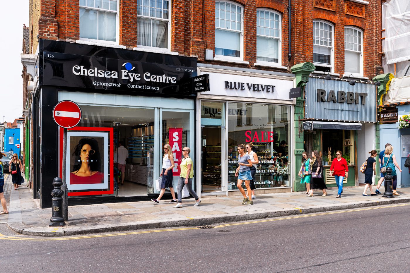 Nabolaget Chelsea med mursteinsarkitektur og butikker langs King’s Road.