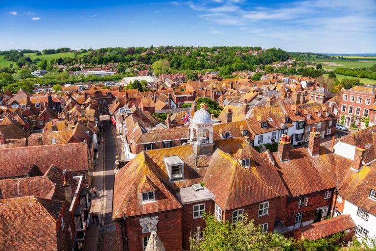 Aerial view of picturesque Rye town, a popular travel destination in East Sussex, England, UK, as seen from the Saint Mary parish church bell tower